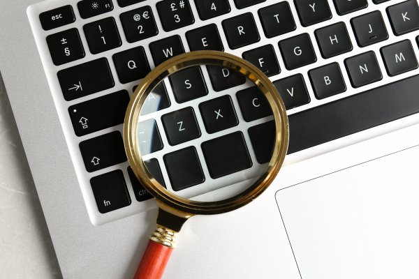 magnifying glass on keyboard